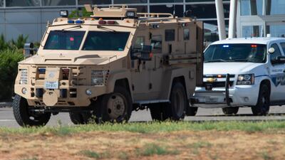 Odessa and Midland police and sheriff's deputies surround the area behind Cinergy movie theater in Odessa, Texas after reports of gunfire. Police said there are "multiple gunshot victims" in West Texas after reports of gunfire on Saturday in the area of Midland and Odessa. AP