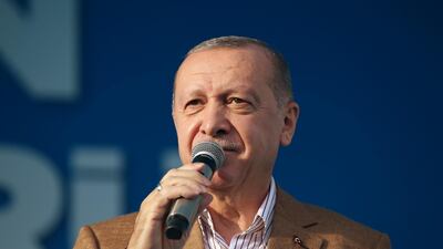 Turkey's President Recep Tayyip Erdogan addresses his ruling party members in eastern city of Malatya on October 25, 2020. Turkish Presidency via AP