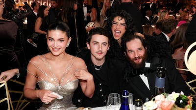 From left, Kylie Jenner, Timothee Chalamet, Odessa A'zion and Josh Safdie at the Golden Globe 2026 awards. Getty