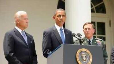 The US president Barack Obama, centre, announced the dismissal of Gen McChrystal following the Rolling Stone interview. He will be replaced by Gen David Petraus, right.