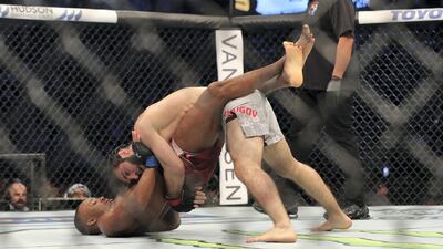 Abu Dhabi, United Arab Emirates - September 07, 2019: Featherweight bout between Lerone Murphy (red shorts, draw) and Zubaira Tukhugov in the Prelims at UFC 242. Saturday the 7th of September 2019. Yas Island, Abu Dhabi. Chris Whiteoak / The National