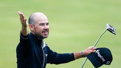 Brian Harman of the US celebrates his victory. PA