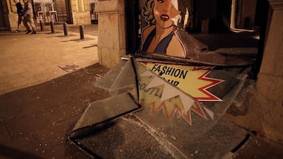 A window shop smashed by anti-government protesters is seen during a protest against the new government, in downtown Beirut. AP Photo