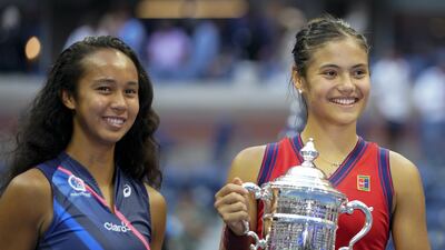 Emma Raducanu celebrates winning the women's singles final alongside runner up Canada's Leylah Fernandez at the US Open, New York, September 11.