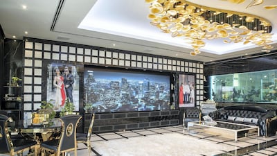 Adel and Sana Sajan's master bedroom comes with a four-metre wide custom-made TV screen as well as a six-metre long aquarium.