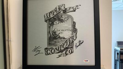 This is a rarely used early rendition of the Apple logo. It's signed by Apple co-founder Steve Wozniak, and the often forgotten co-founder Ron Wayne. Cody Combs / The National