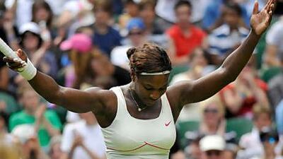 Serena Williams of the US celebrates winning her match against Portugal's Michelle Larcher De Brito.