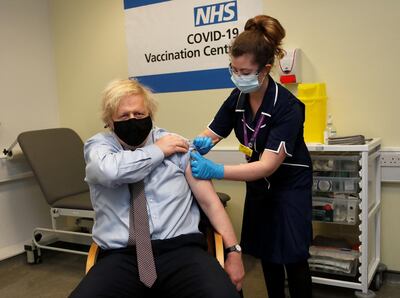 UK Prime Minister Boris Johnson receives a dose of AstraZeneca’s Covid-19 vaccine at St Thomas’ Hospital, London. AFP