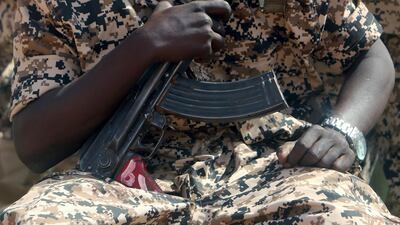 A member of the Sudanese Army ears a skull-emblazoned face mask at the war games with Egypt. EPA