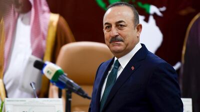 Turkish Foreign Minister Mevlut Cavusoglu arrives for an emergency ministerial meeting of the Organisation of Islamic Cooperation (OIC) in Jeddah. AFP