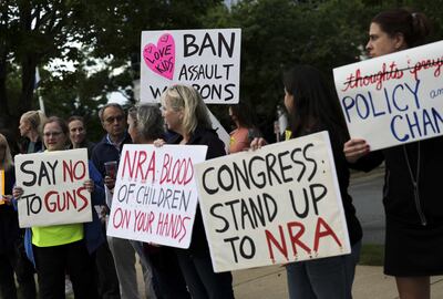 Gun-control advocates hold a vigil outside of the National Rifle Association headquarters in Fairfax, Virginia. Getty Images / AFP
