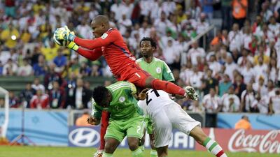 Nigeria keeper Vincent Enyeama makes a save against Iran in their Group F match at the 2014 World Cup on Monday. Fernando Vergara / AP / June 16, 2014