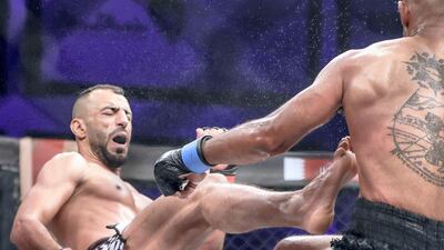 Brave Combat Federation 27 at the Mubadala Arena. Bantamweight: (L_R) Jalal Al Daaja (JOR) gives a front kick during his bout against Tariq Ismail (CAN). Victor Besa / The National