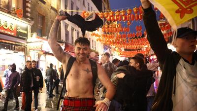Scotland fans celebrate in London after the 0-0 draw with England. Reuters