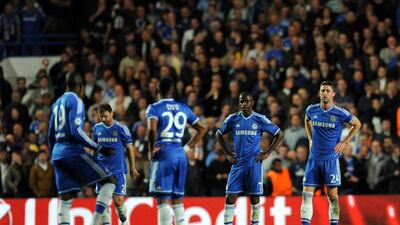 Chelsea players react after losing to Atletico Madrid in the Champions League semi-final on Wednesday. Andy Rain / EPA / April 30, 2014