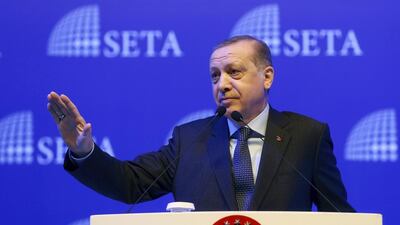 Turkey's President Recep Tayyip Erdogan addresses his supporters in Istanbul, Saturday, Feb. 11, 2017. Turkey's electoral board on Saturday confirmed April 16 as the date of a national referendum on expanding the president's powers, but the main opposition leader predicts he will face an "unfair" campaign process. (Kayhan Ozer/Pool Photo via AP)