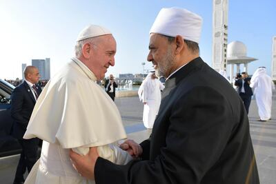 Pope Francis shakes hands with Grand Sheik Ahmed al Tayeb as he arrives for a meeting with members of Muslim Council of Elders at Grand Mosque of Sheik Zayed in Abu Dhabi. EPA/VATICAN MEDIA HANDOUT