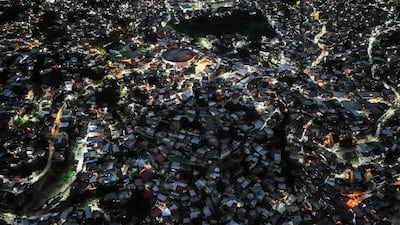 Houses in the Petare neighbourhood of Caracas, where power was gradually returning after Venezuela was hit by a widespread power cut. AFP