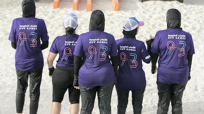 Participants of the muscle crusher challenge on the first day of Dubai Government Games in Kite Beach, Dubai, UAE, on May 9, 2018. Reem Mohammed / The National