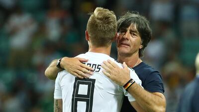 Germany's Toni Kroos scored the winner before being congratulated by manager Joachim Low. Michael Dalder / Reuters