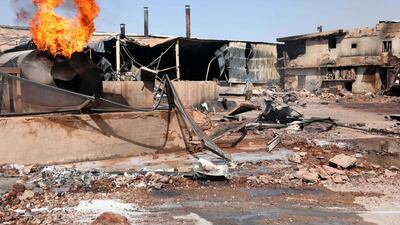 Flames rise from a tile manufacturing unit after an explosion in an industrial zone, north Khartoum, Sudan, December 3, 2019. EPA/MARWAN ALI