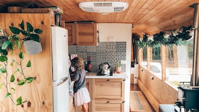The bus is now home to a homely living space, a kitchen complete with a full size fridge-freezer, stove and washing machine, a master bedroom with a spacious queen-size bed, an extra bedroom for the girls and even a bath and shower room. Courtesy Marte Snorresdotter Rovik
