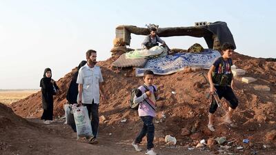 The war has resulted in many Syrians crossing borders and seas, turning the revolution into a humanitarian disaster for neighbouring countries and for Europe. Nazeer Al Khatib / AFP