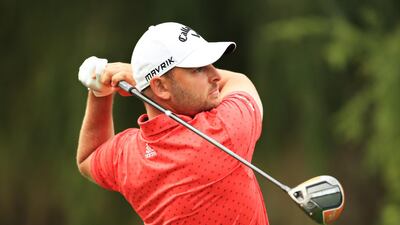 Jordan Smith of England plays his shot from the 12th tee. Getty Images
