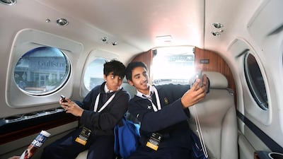 The Abu Dhabi Air Expo opened February 24 at Al Bateen Executive Airport and attracted 17,000 visitors, including these students from the Australian School of Abu Dhabi. Delores Johnson / The National