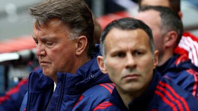 Louis van Gaal, left, and Ryan Giggs may or may not continue at Manchester United. Paul Gilham / Getty Images