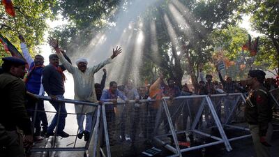 Supporters of India's ruling Bharatiya Janata Party shout slogans during a protest against what they call 'disinformation' by India's main opposition Congress party on a deal to buy Rafale fighter planes from a French company, in Chandigarh, India. Reuters