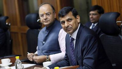 Reserve Bank of India (RBI) governor Raghuram Rajan and India's Finance Minister Arun Jaitley (left) attend the board of directors meeting of the RBI, in New Delhi on August 10, 2014. Anindito Mukherjee / Reuters