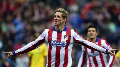 Fernando Torres insists anything less than full commitment from Atletico against Barcelona is "absurd." Javier Soriano / AFP