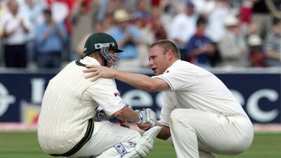 England’s Andrew Flintoff, right, consoling Brett Lee of Australia during their titanic series in 2005 was a stand-out moment. Tom Shaw / Getty Images