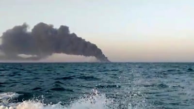 The Iranian navy support ship burns in still from a video. Asriran.com via AP