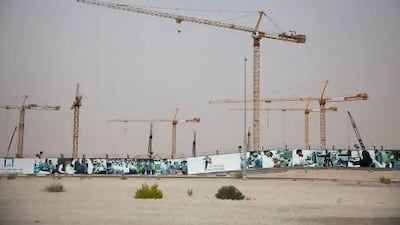 Cranes can be seen at the future colleges’ campus in Madinat Zayed. People in the area are pleased with the development. Silvia Razgova / The National