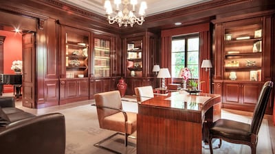 The wood-lined study is ready for serious business. Courtesy Luxhabitat