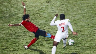Al Ahly defender Mohamed Hany challengesh Zamalek's Kabongo Kasongo. AFP