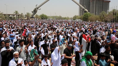 Supporters of Iraqi cleric Moqtada Al Sadr perform Friday prayers inside Baghdad's Green Zone. They are opposed to the nomination of an ally of Nouri Al Maliki as prime minister. EPA