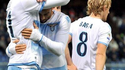 Lazio's Serbian midfielder Sergej Milinkovic Savic, left, celebrates with his teammate Felipe Anderson after the first goal on Saturday. Simone Arveda / ANSA / AP / December 10 2016