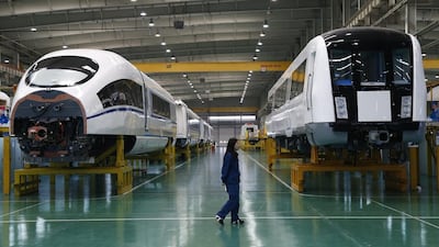 Completed train cars at an assembly plant of the Tangshan Railway Vehicle in Hebei province, China. Rolex Dela Pena / EPA