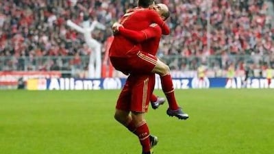 Bayern's Franck Ribery, left, and Arjen Robben celebrate a goal during Saturday's thrashing of Hoffenheim.