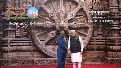 Indian Prime Minister Narendra Modi (right) welcomes Comoros President and African Union Chairman Azali Assoumani to the G20 Summit in New Delhi on Saturday. EPA