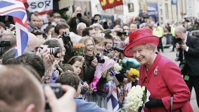 Queen Elizabeth II celebrates her 80th birthday in Windsor in 2006 with a multitude of camera-wielding royal fans. Photo: Tim Graham