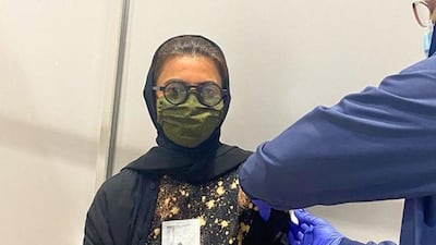 Noura Al Kaabi, Minister of Culture and Youth, taking the Covid-19 jab.