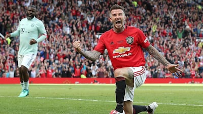 David Beckham celebrates his goal in the 5-0 win for Manchester United Legends against Bayern Munich. PA Sport