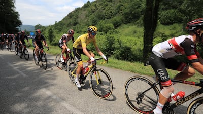 Slovenian rider Tadej Pogacar with UAE Team Emirates teammates.