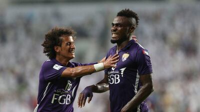 Emmanuel Emenike, right, scored a penalty as Al Ain ran out 4-1 winners at Al Shabab. Courtesy: Al Ittihad