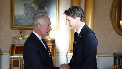 King Charles III shakes hands with Canadian Prime Minister Justin Trudeau at Buckingham Palace, London, in September 2022. PA