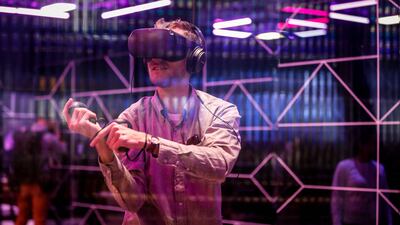A user tries out the Oculus Quest virtual reality gaming system at the Facebook F8 Conference in San Jose, California. AFP